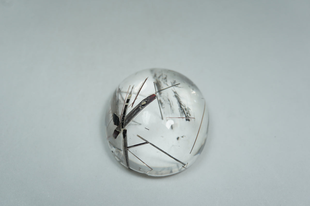 29.05ct Quartz with inclusion cabochon 22x19mm