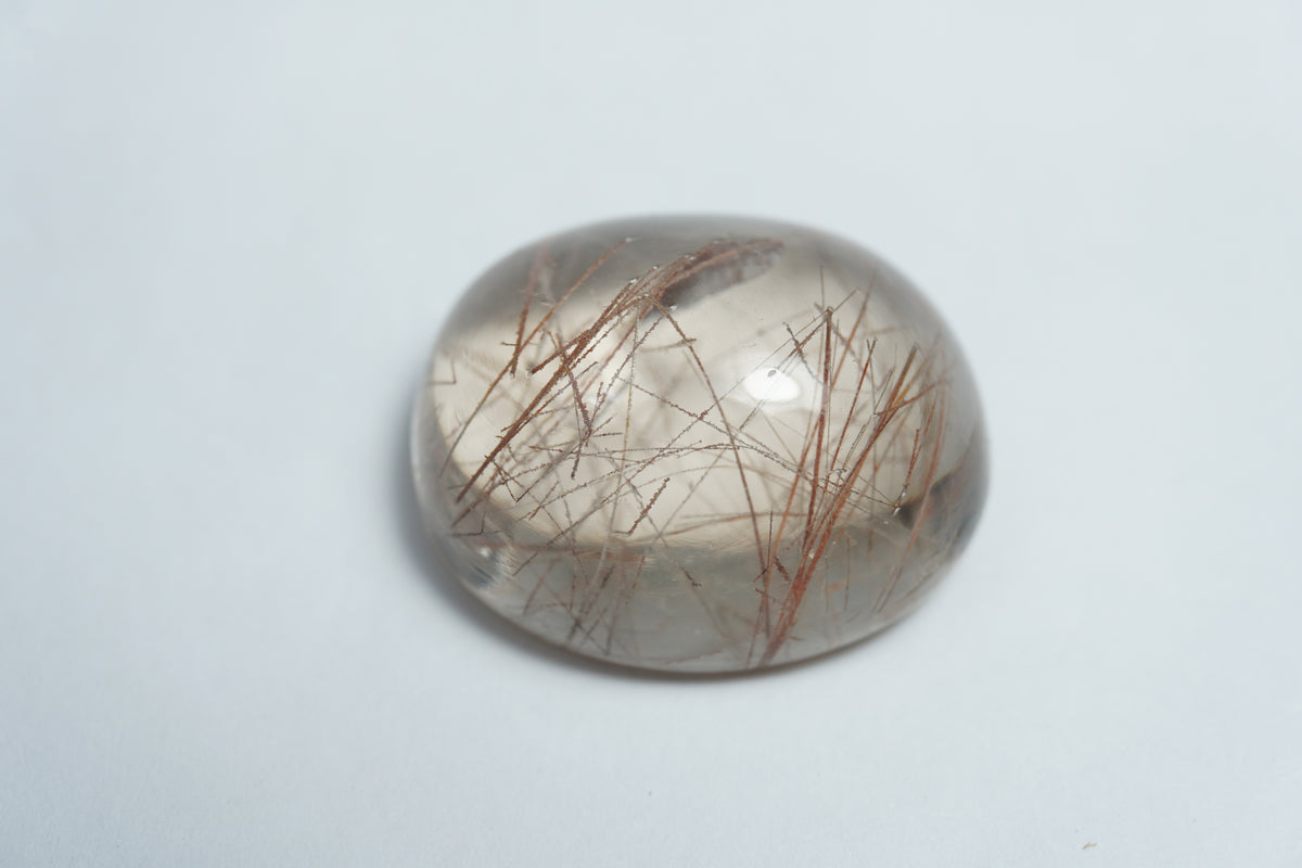36.50ct Quartz with inclusion cabochon 24x11mm