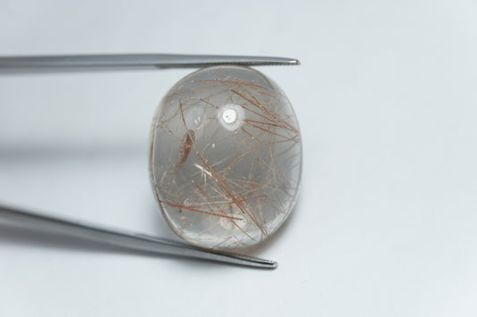 36.50ct Quartz with inclusion cabochon 24x11mm