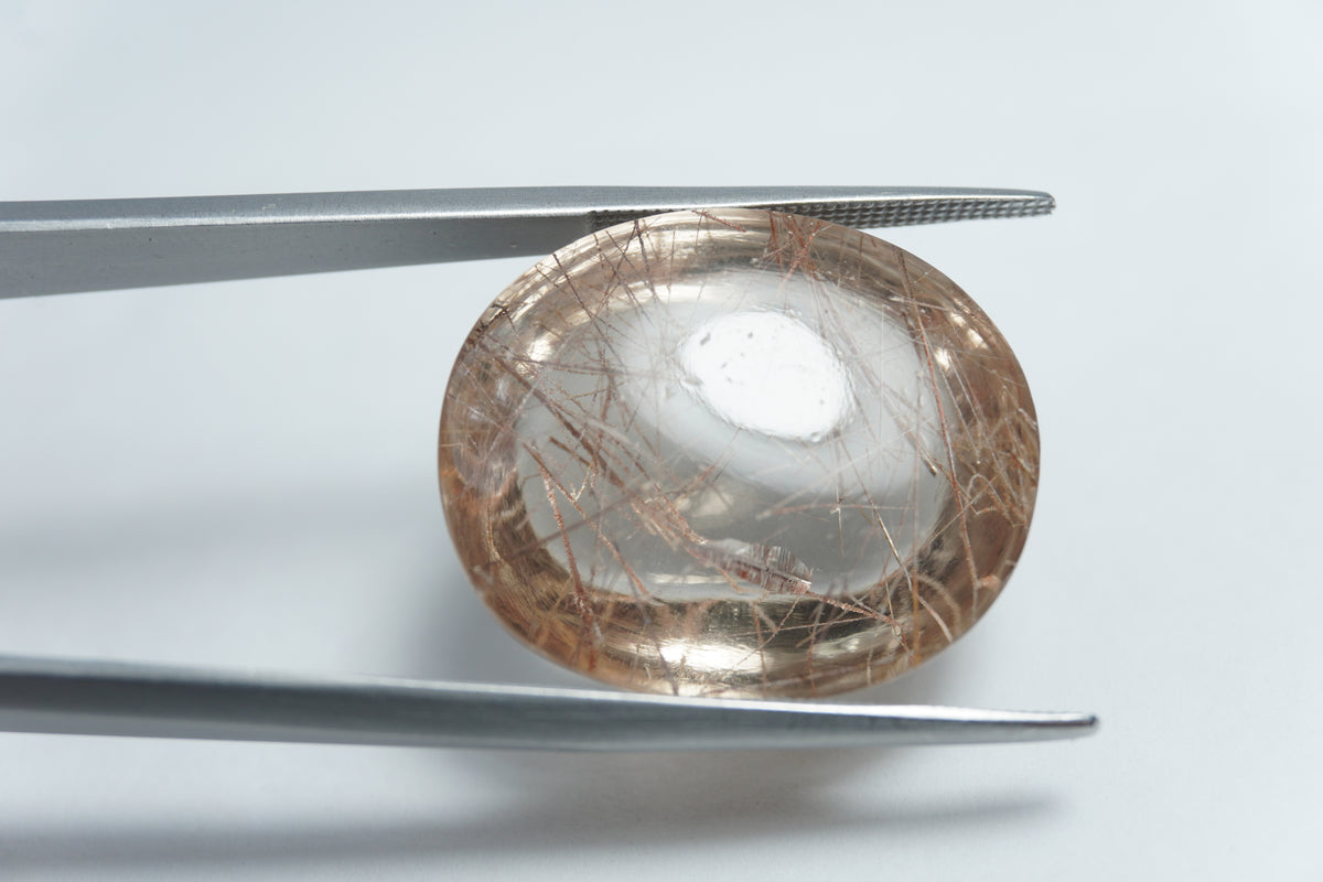 36.50ct Quartz with inclusion cabochon 24x11mm