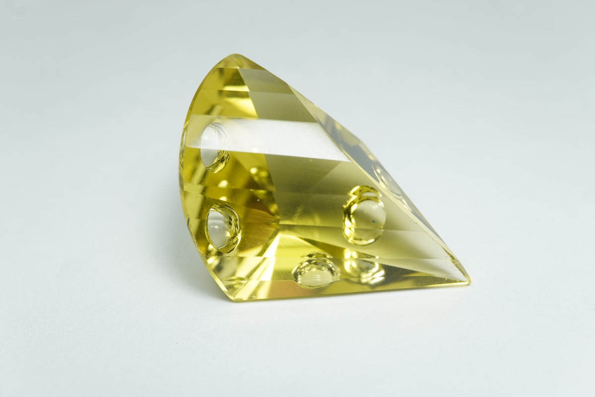 24.86ct Green gold with bubbles 22x17mm