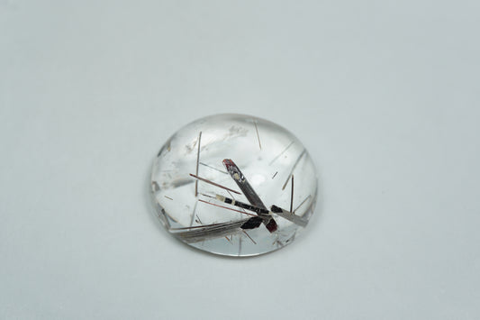 29.05ct Quartz with inclusion cabochon 22x19mm