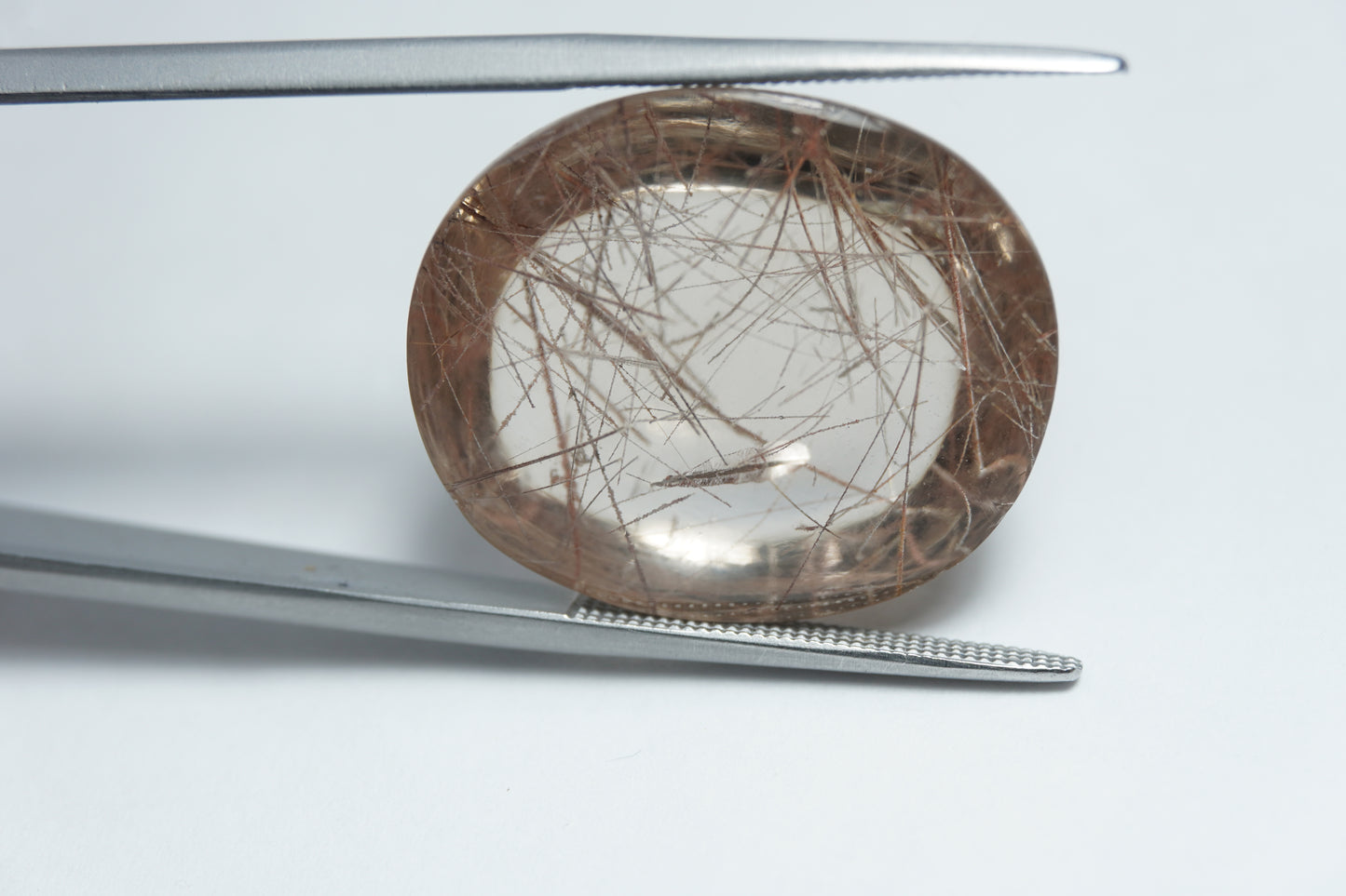 36.50ct Quartz with inclusion cabochon 24x11mm