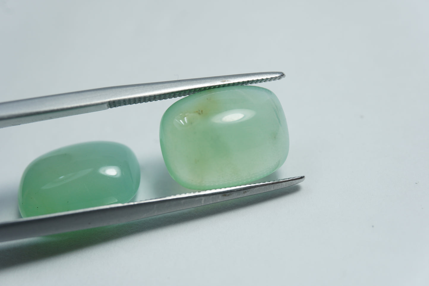 9.80ct Opal green cabochon 13x10mm
