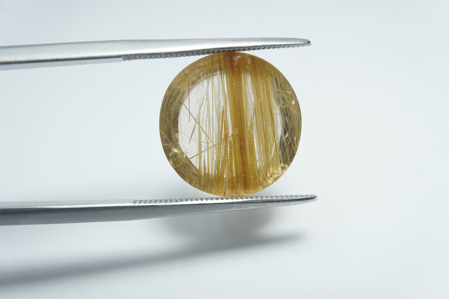 20.17ct Rutile cabochon 15x14mm