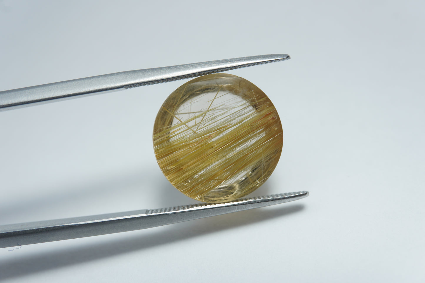 20.17ct Rutile cabochon 15x14mm