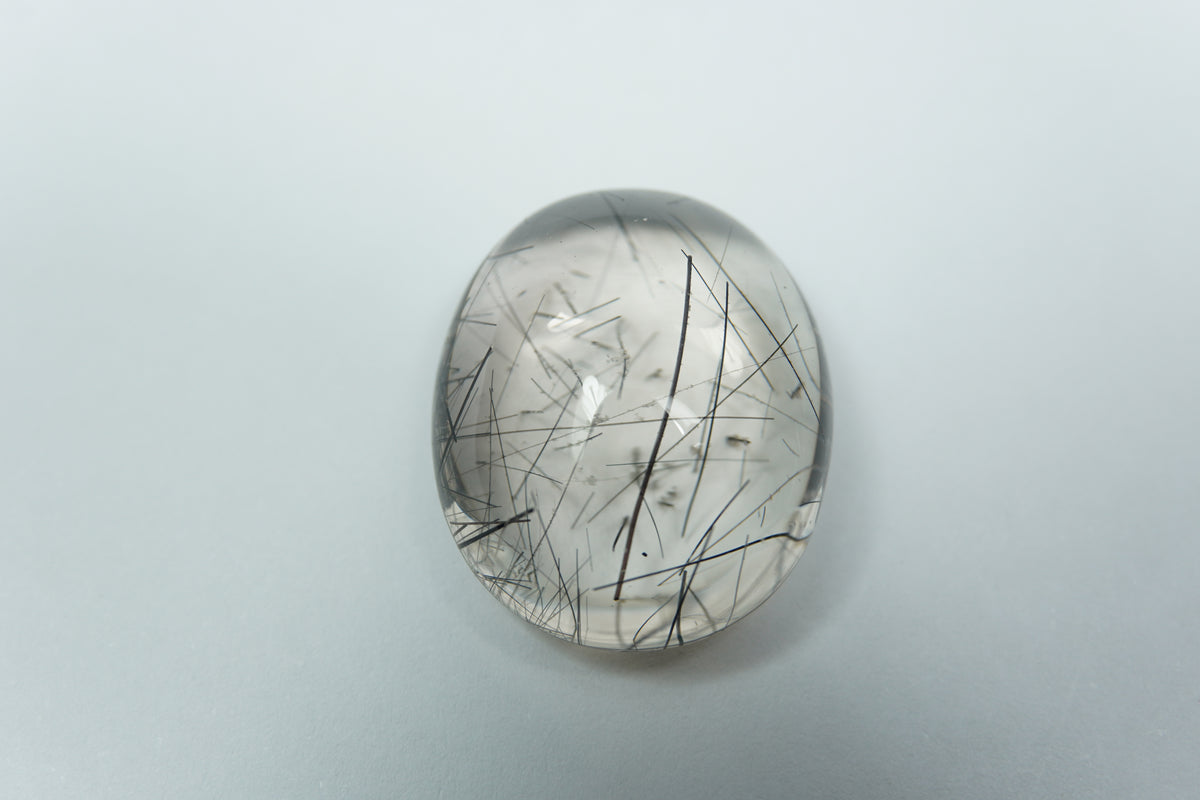 30.60ct Quartz with inclusion cabochon 23x19mm