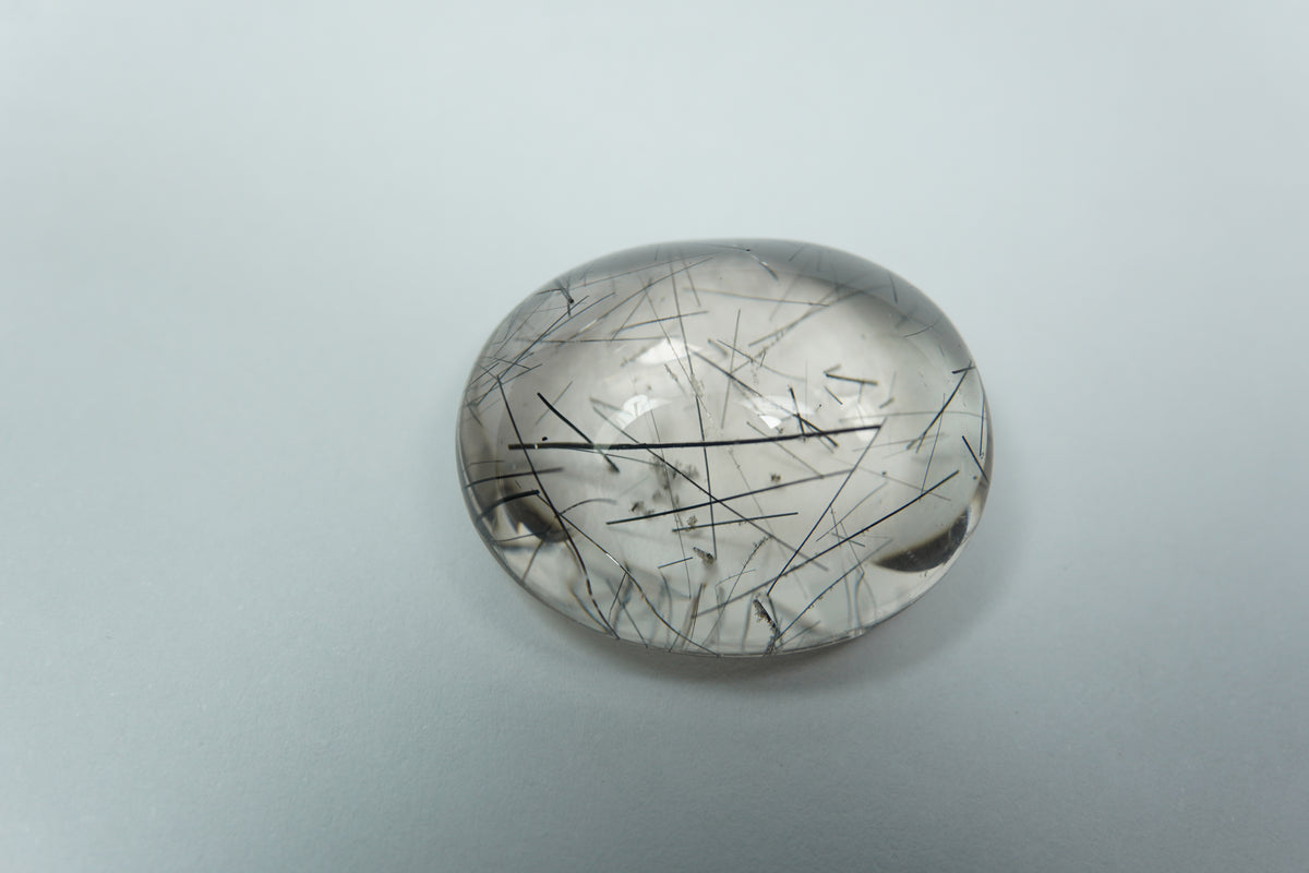 30.60ct Quartz with inclusion cabochon 23x19mm