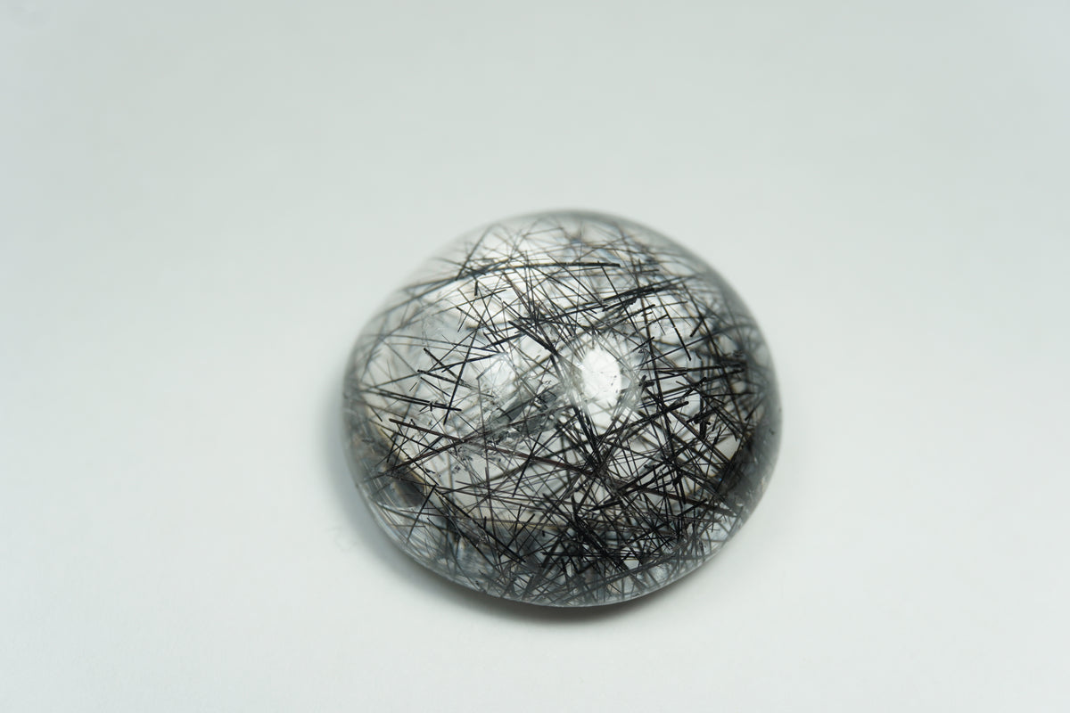 41.10ct Quartz with inclusion cabochon 23mm