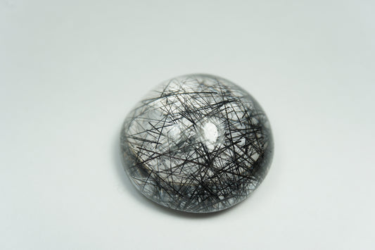 41.10ct Quartz with inclusion cabochon 23mm