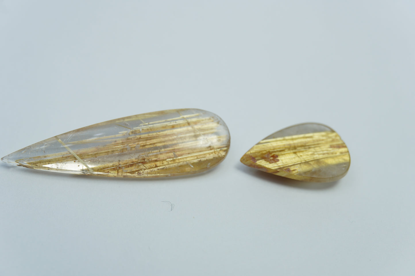 18.10ct Rutiles 34x11mm / 17x12mm