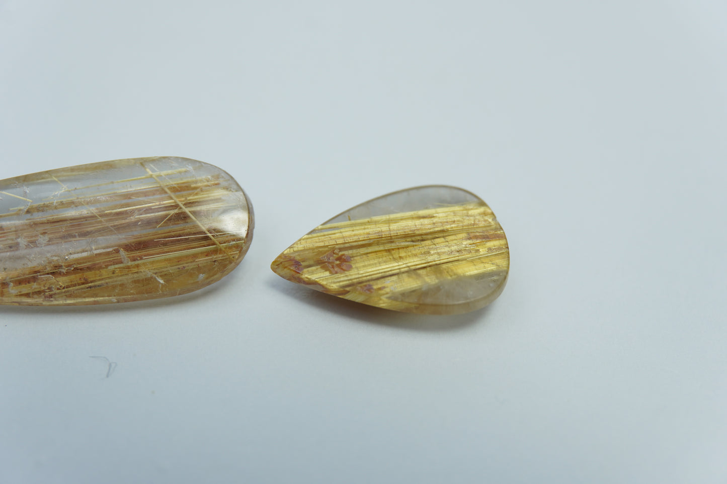 18.10ct Rutiles 34x11mm / 17x12mm