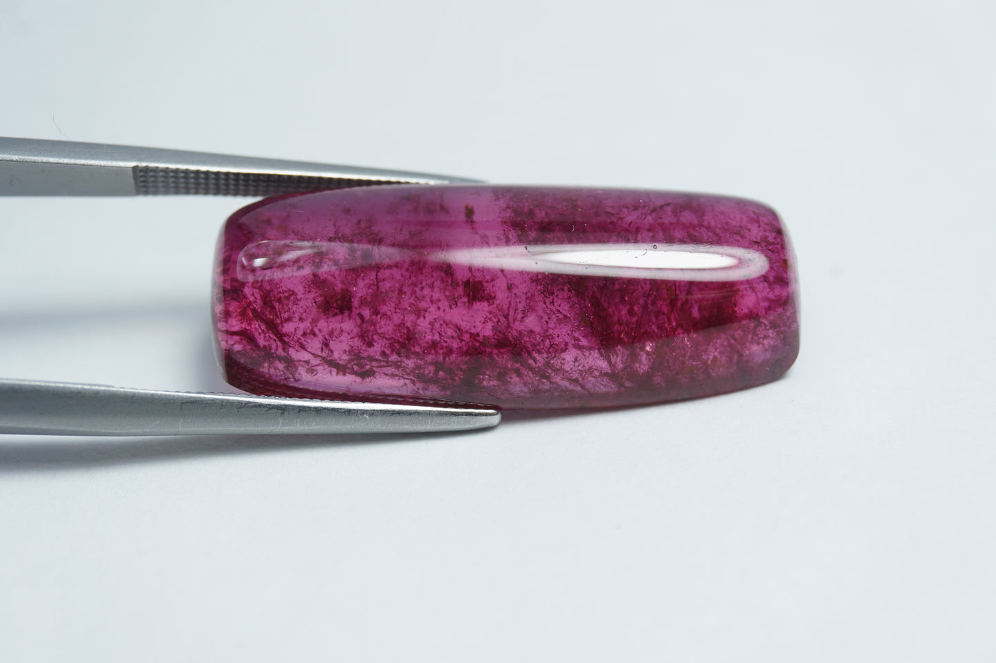 21.35ct Rubellite cabochon 30x12mm