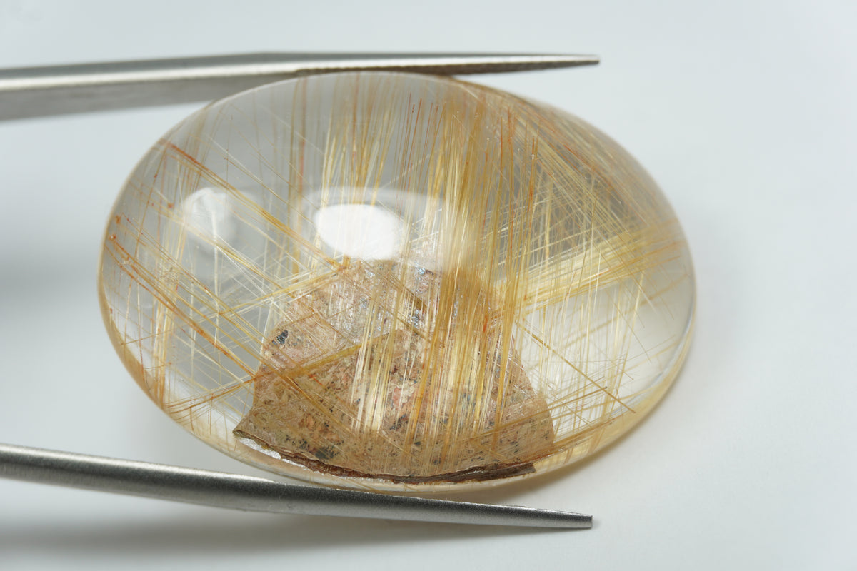 56.50ct Rutile cabochon 34x24mm