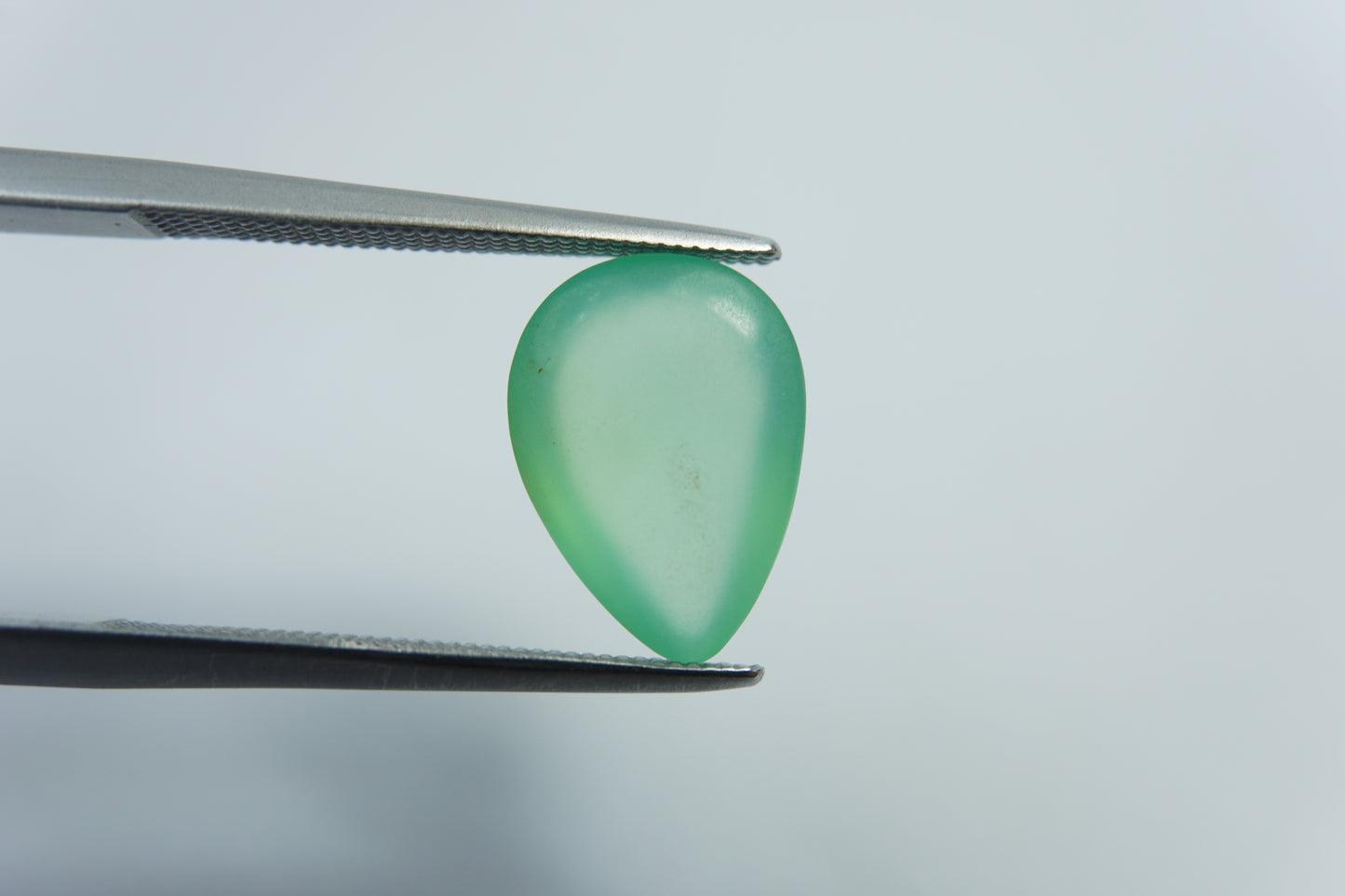 3.15ct Opal green cabochon 12x9mm