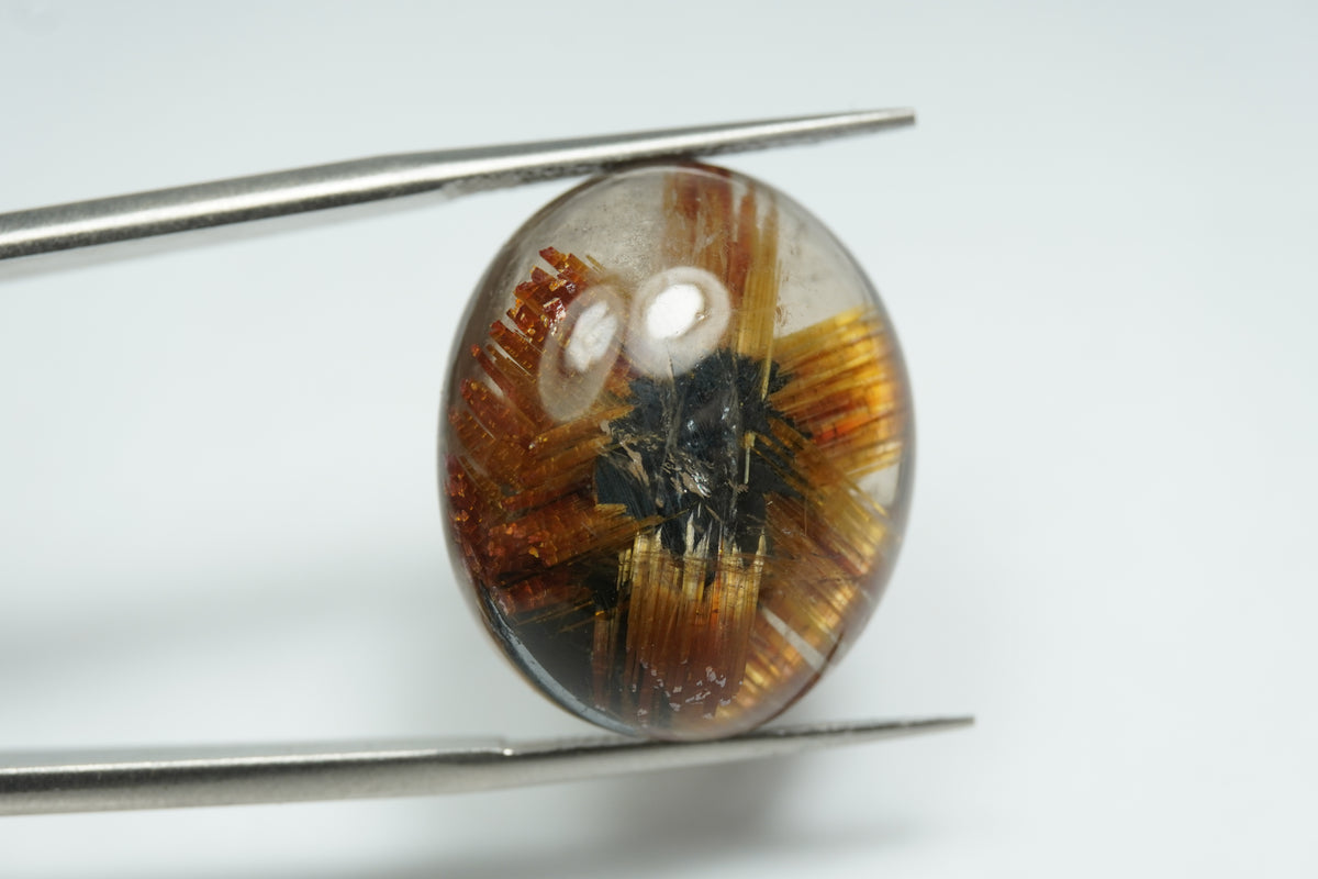20.65ct Rutile cabochon 21x17mm