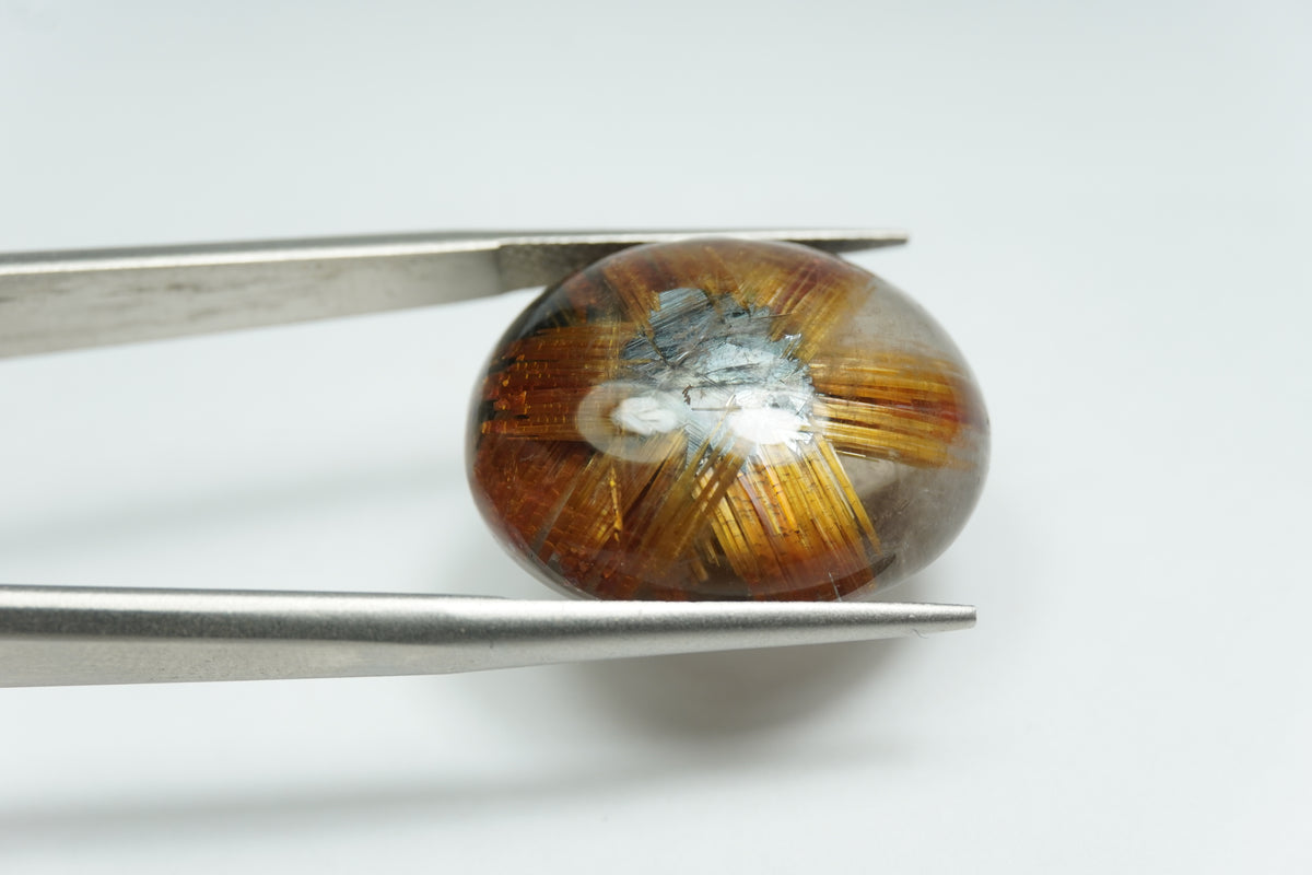 20.65ct Rutile cabochon 21x17mm