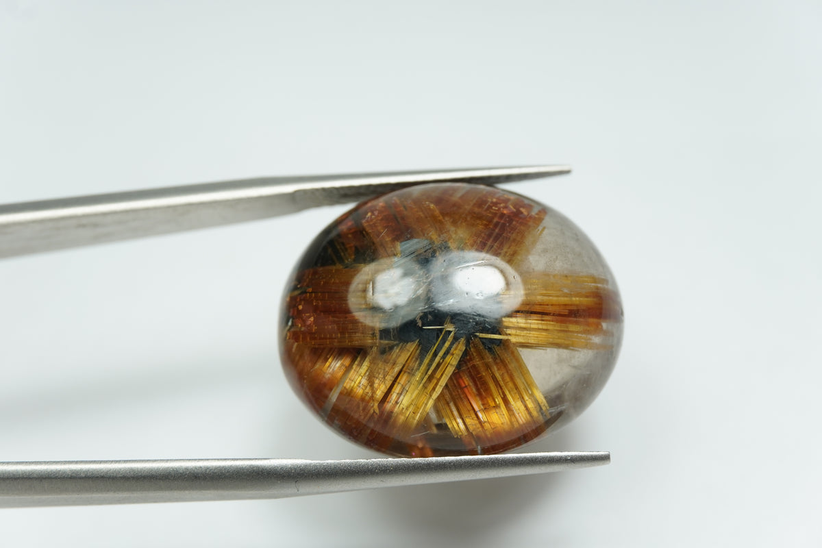 20.65ct Rutile cabochon 21x17mm