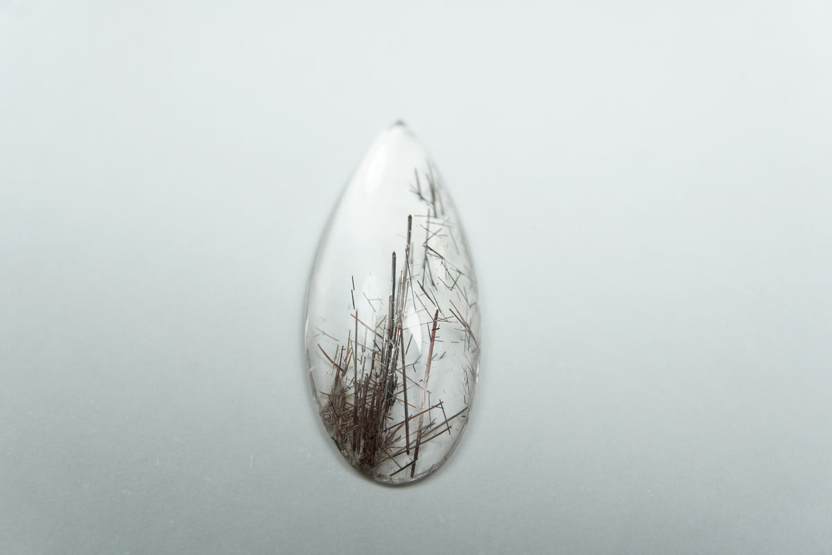 8.35ct Quartz with inclusion cabochon 25x11mm