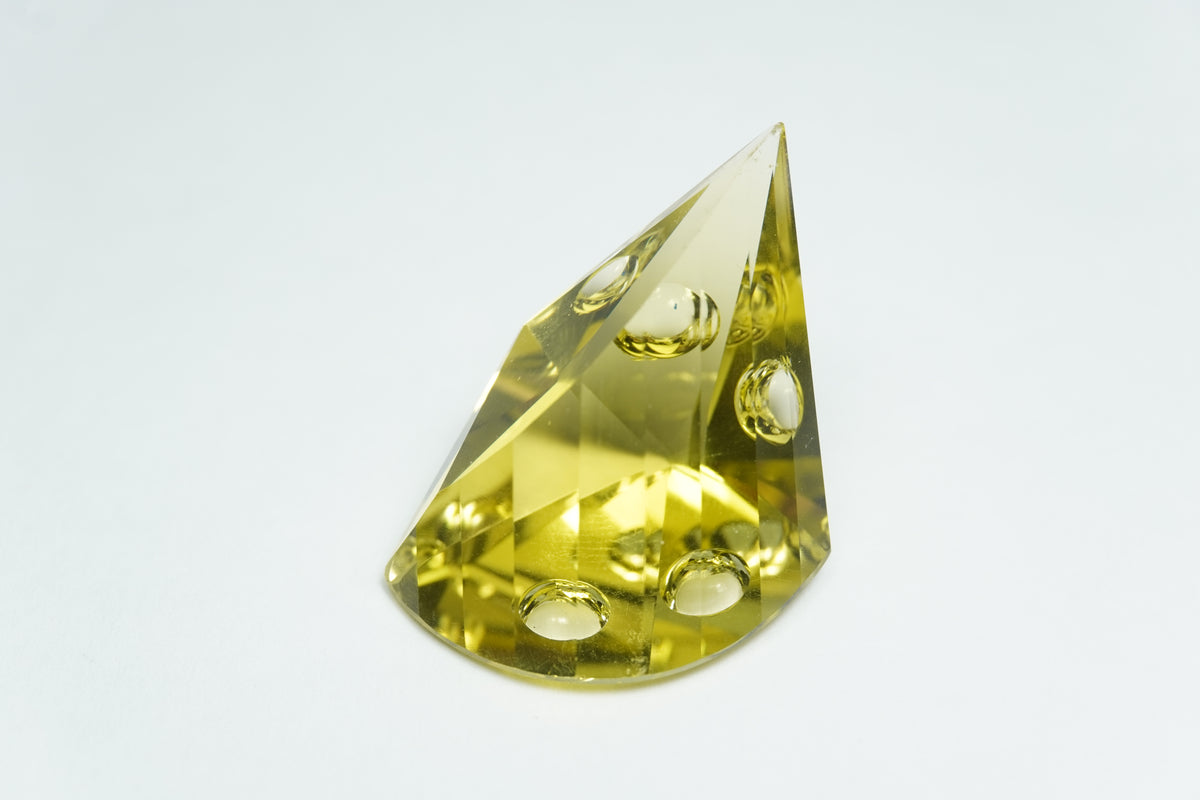 24.86ct Green gold with bubbles 22x17mm