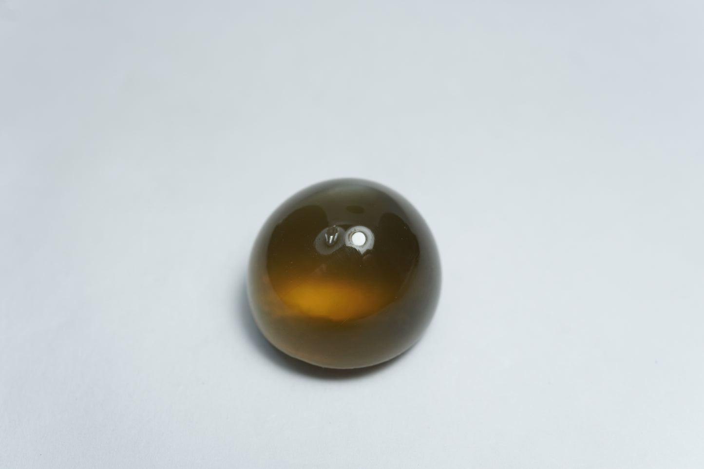 37.25ct Quartz cabochon with stripe 19mm
