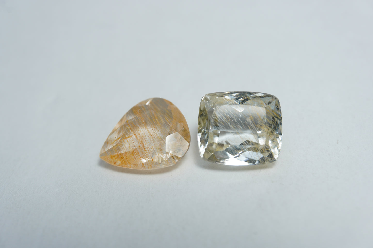 10.88ct Topaz with rutile 10x9mm / 12mm