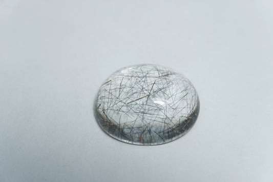 20.50ct Quartz with inclusion cabochon 21x18mm
