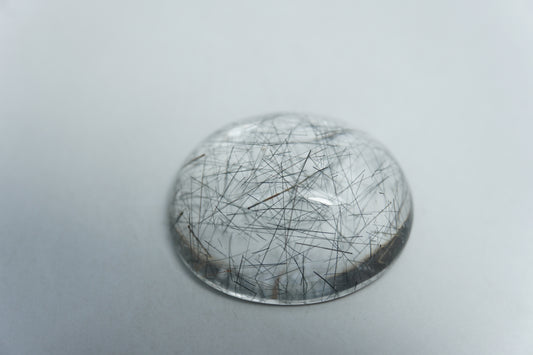 20.50ct Quartz with inclusion cabochon 21x18mm