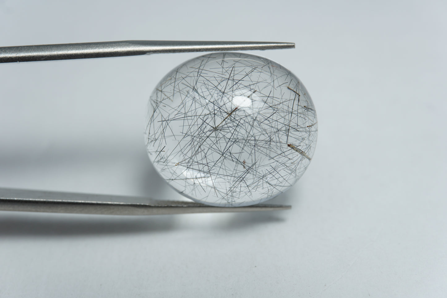 20.50ct Quartz with inclusion cabochon 21x18mm