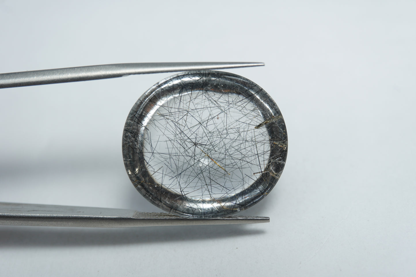 20.50ct Quartz with inclusion cabochon 21x18mm
